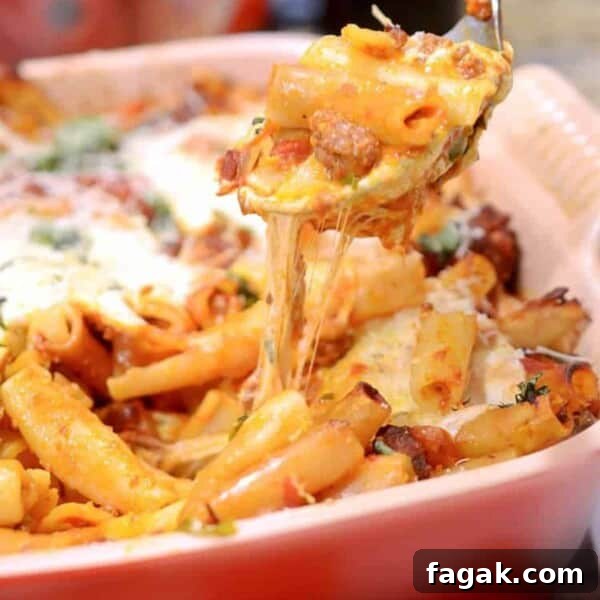 A pan of pasta with tomato sauce.