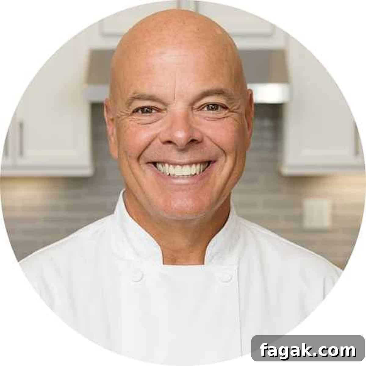 A man in a chefs jacket.
