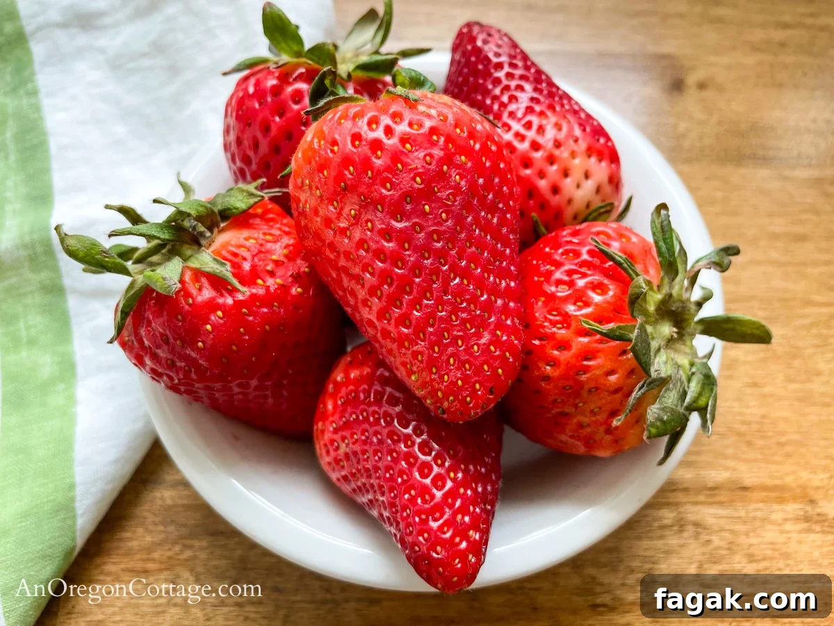 strawberries in white bowl