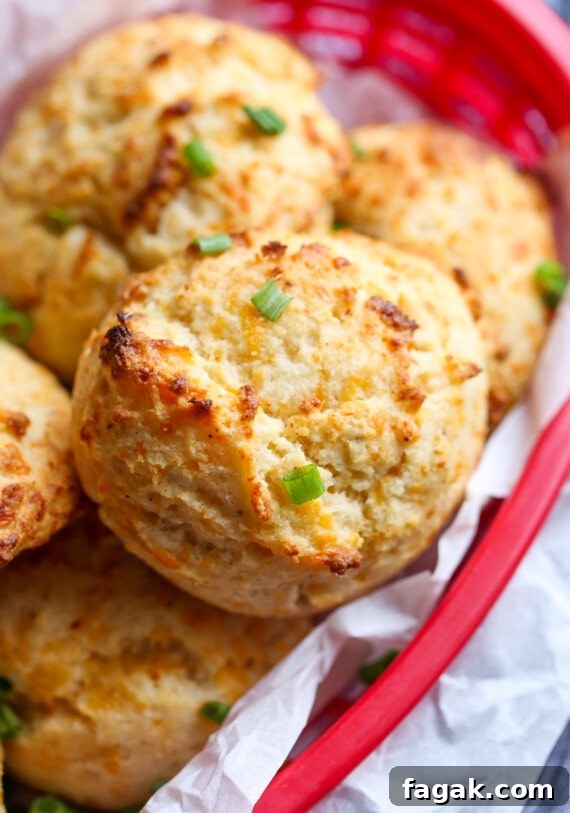 copycat red lobster biscuits stacked in a red basket