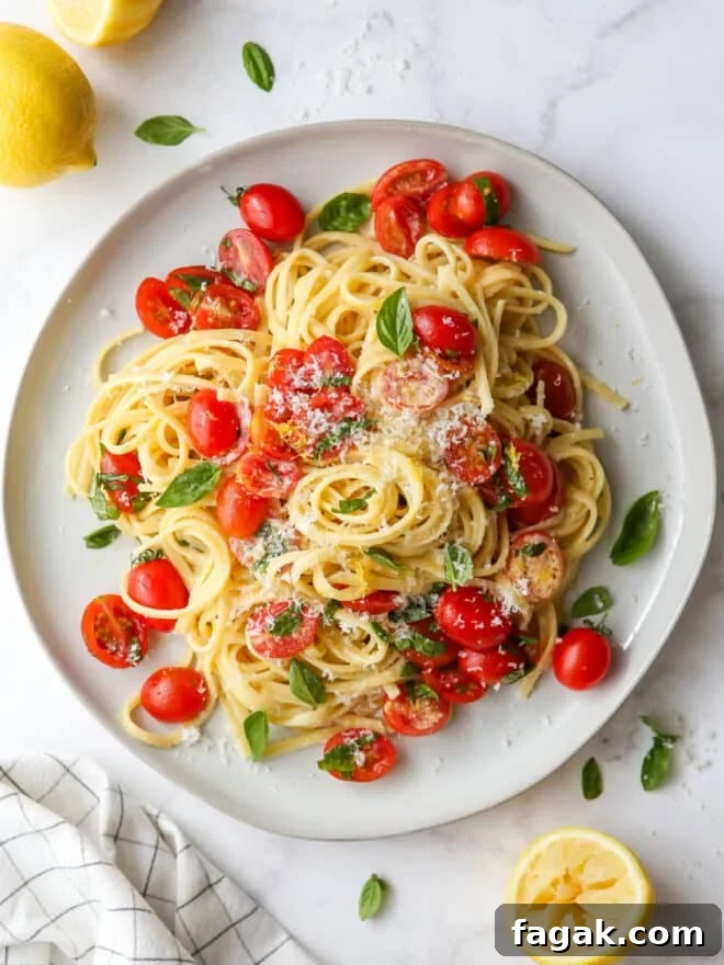 lemon pasta with tomatoes and basil on a plate