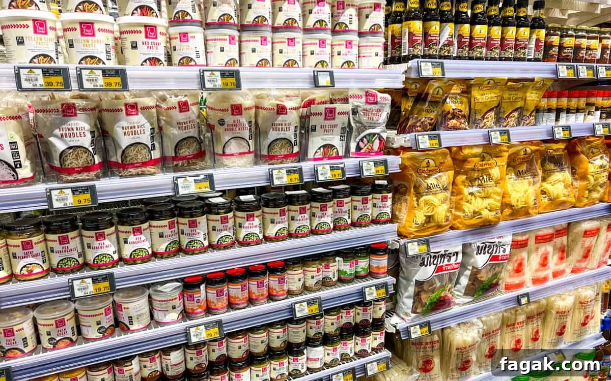 Photo of supermarket shelves filled with Thai condiments.