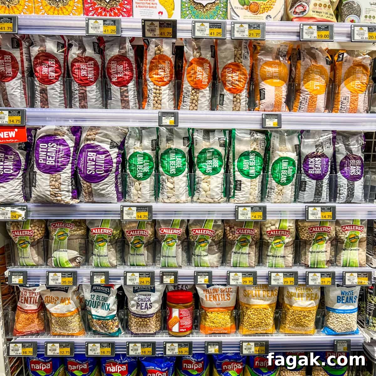 Photo of rows of shelves of dried bean packets in a supermarket.