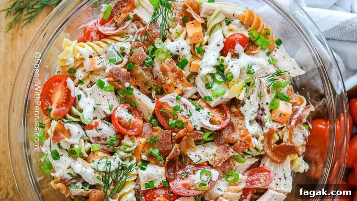 Creamy Chicken Pasta Salad in a glass bowl.