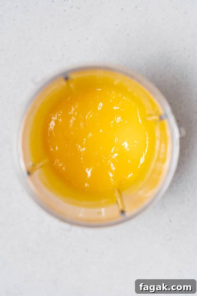 Creamy Mango Chia Pudding Recipe for Tropical Breakfast 6 pureed mango in blender