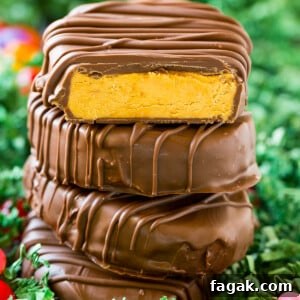 A stack of peanut butter eggs coated in chocolate.