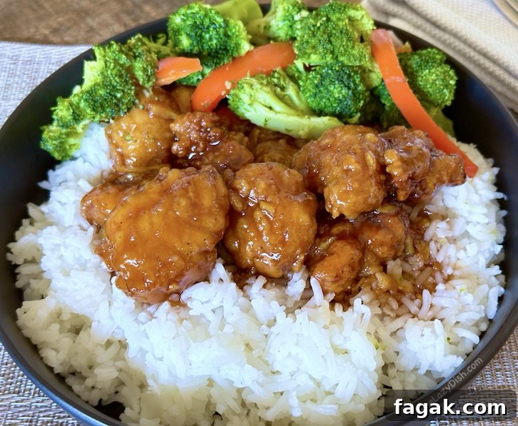 Simple and fast dinner idea for one or the entire family. Using only 5 ingredients you can make the best orange chicken at home as a quick meal when time is short. frozen chicken and minute rice make this meal extra lazy too!
