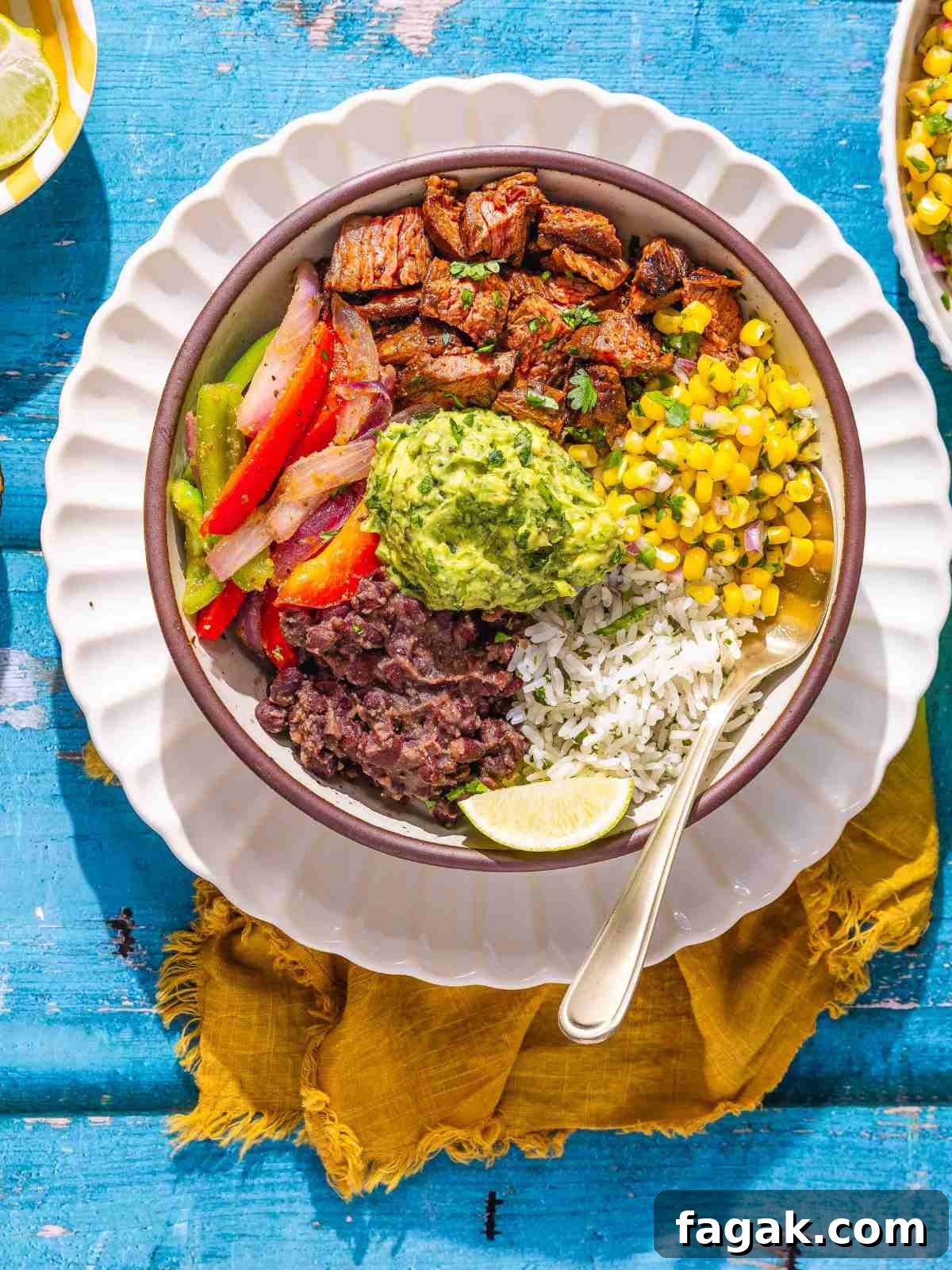 smoky chipotle steak with rice, beans, and vegetables.