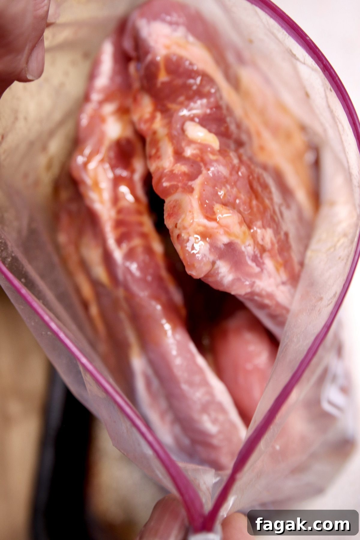 how to marinate and grill spare ribs with bbq mop sauce. marinating spare ribs in a gallon baggie.