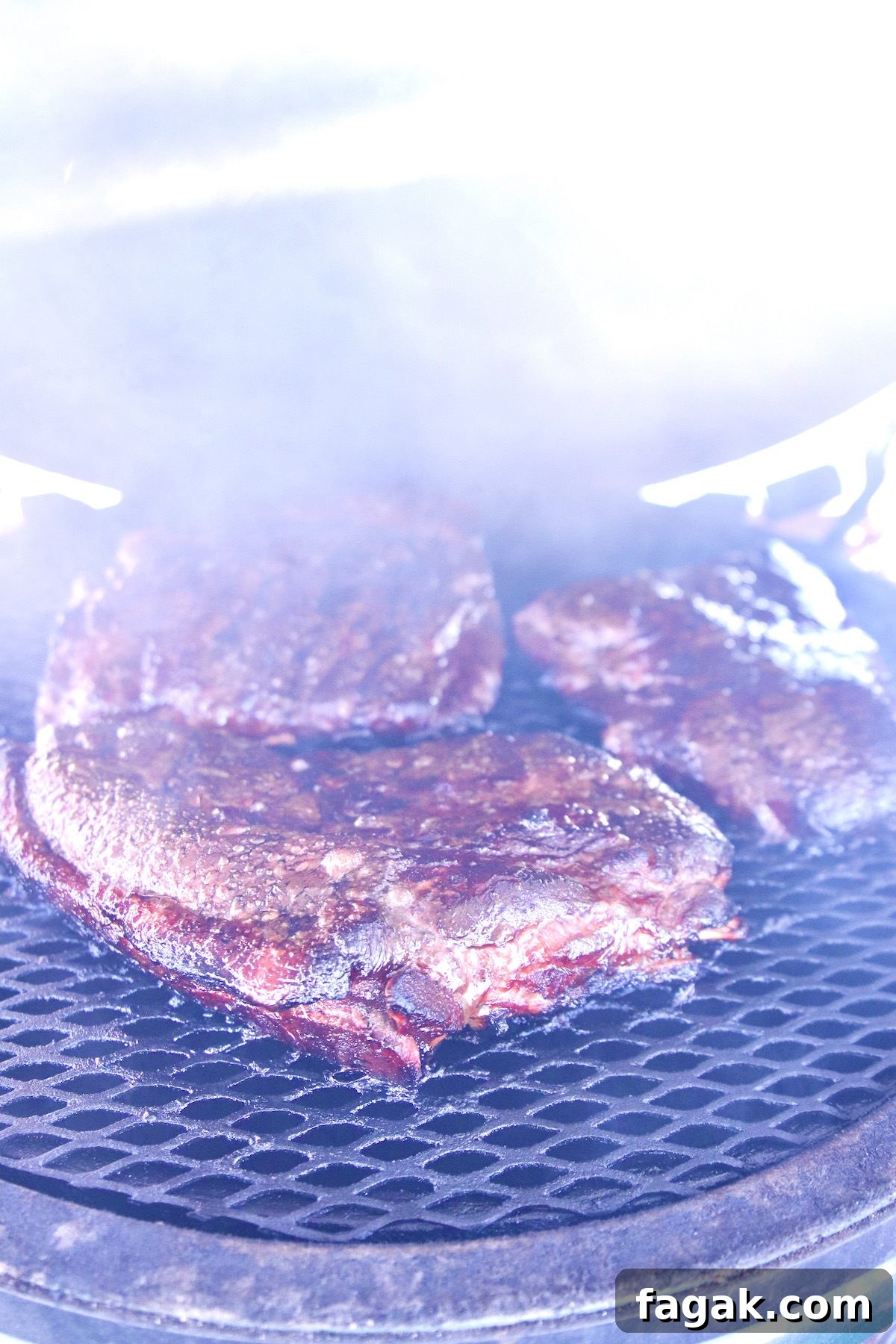 easy marinated and grilled ribs with bbq mop sauce. smoky grill with spare ribs.