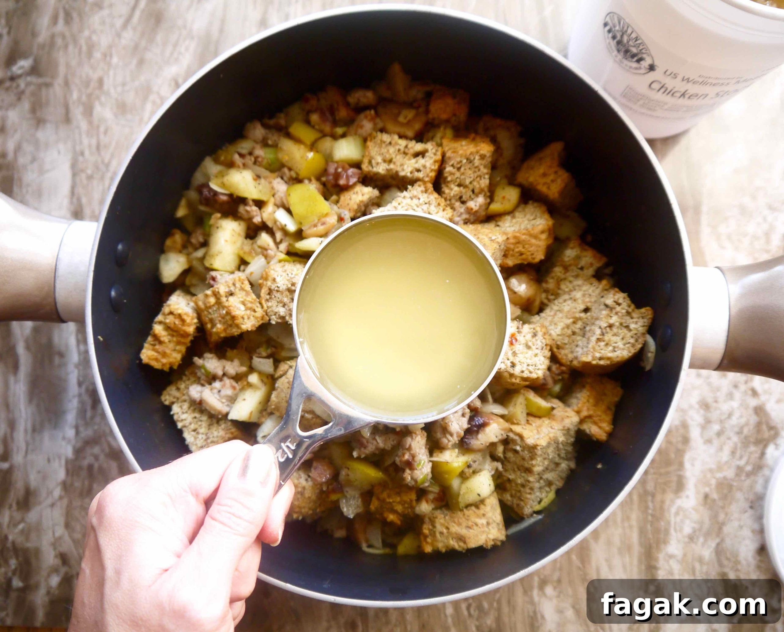 Paleo stuffing with sausage being made in a pan.