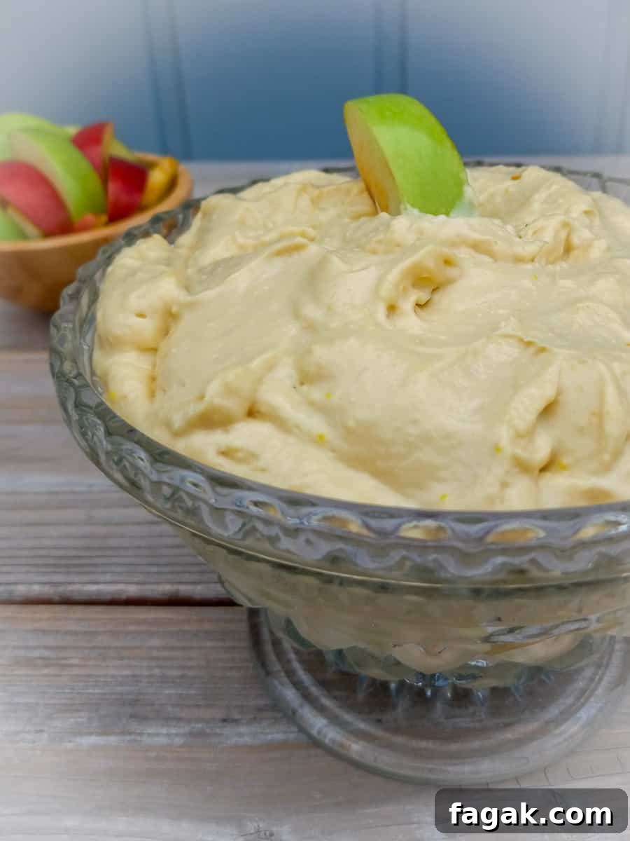 bowl of Amish caramel dip and a bowl of apples
