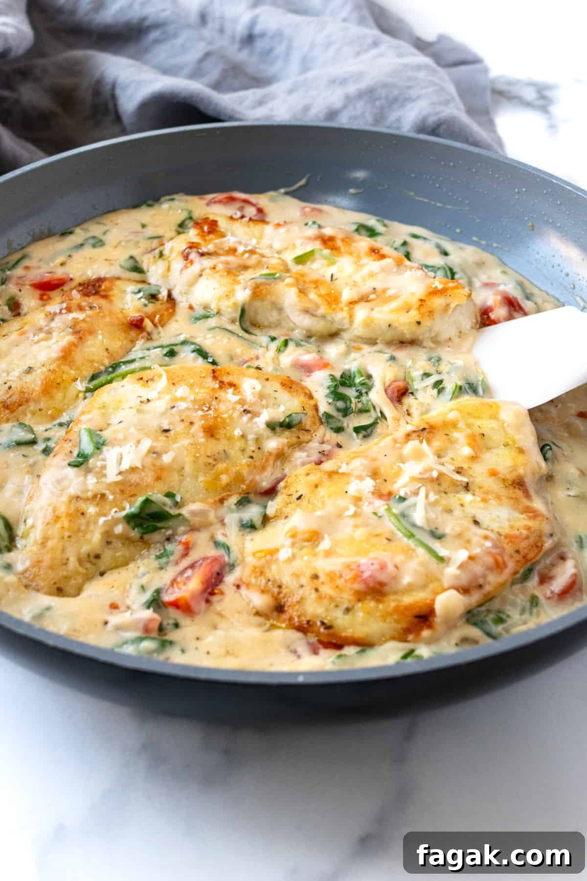 Creamy Chicken Florentine with Spinach and Parmesan 2 Creamy Chicken Florentine in a Skillet.