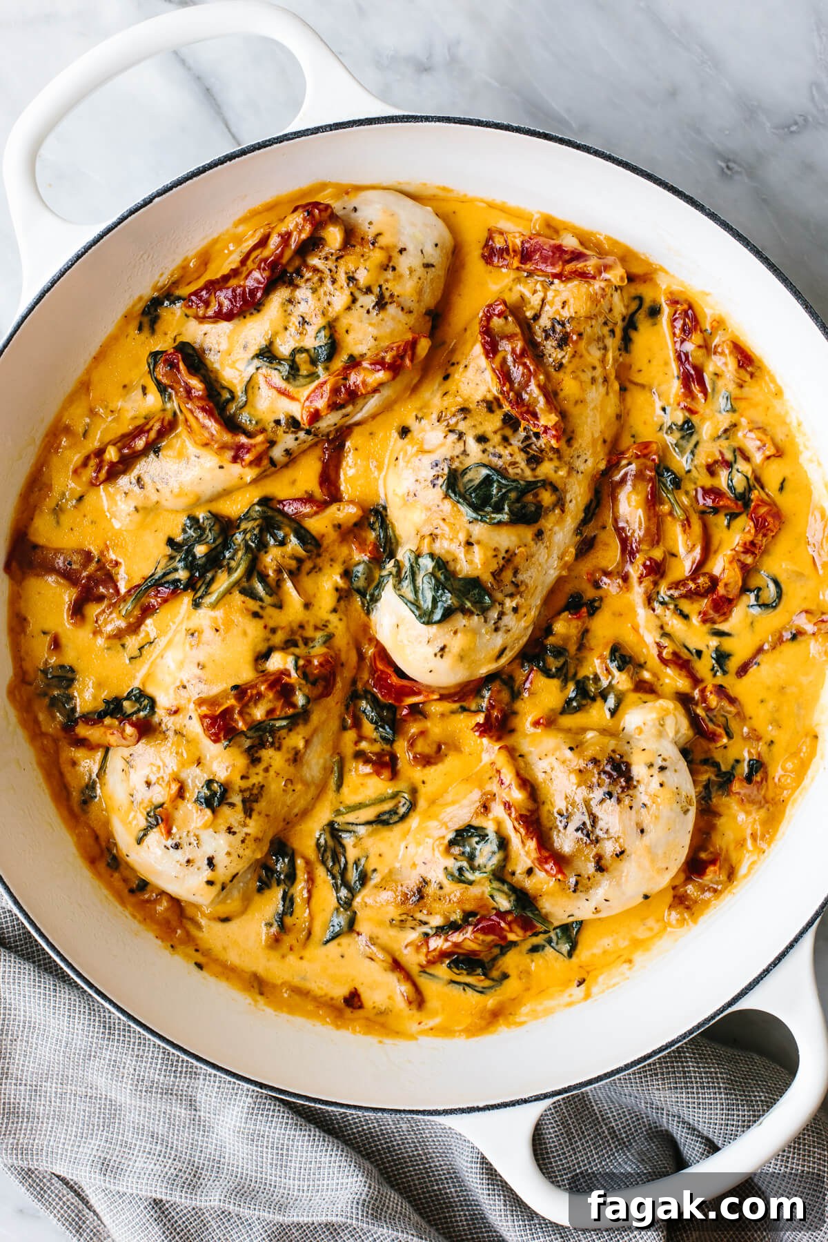A skillet of tuscan chicken