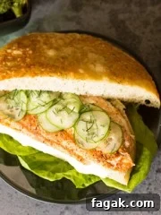 Blackened salmon in focaccia bread and fries