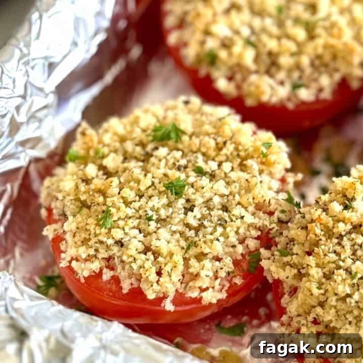 Cheesy crumb tomatoes in a pan.