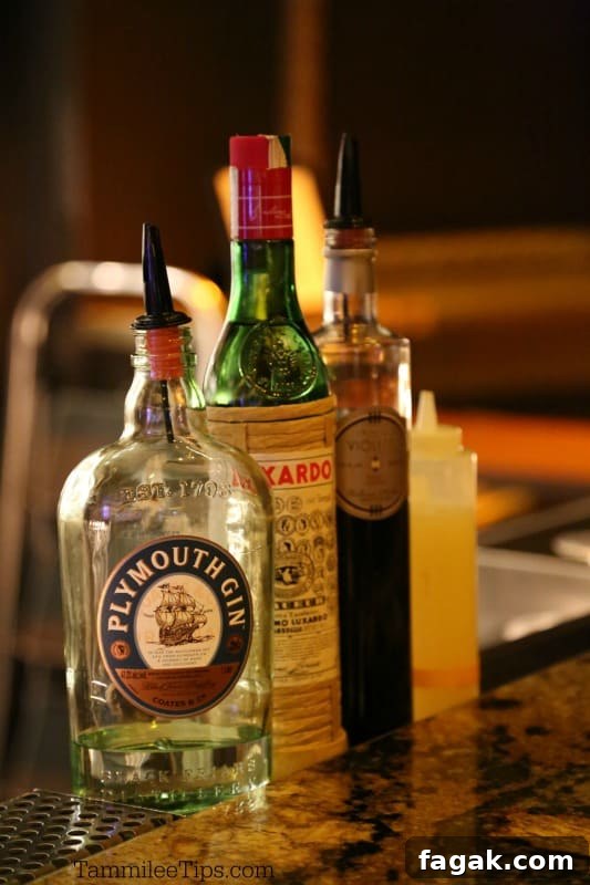 Plymouth Gin, Luxardo liqueur, and creme de violet at a bar