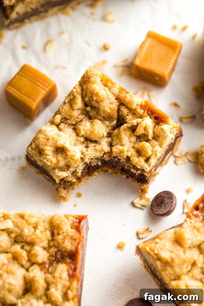 Close-up of a carmelita bar with one bite taken out.