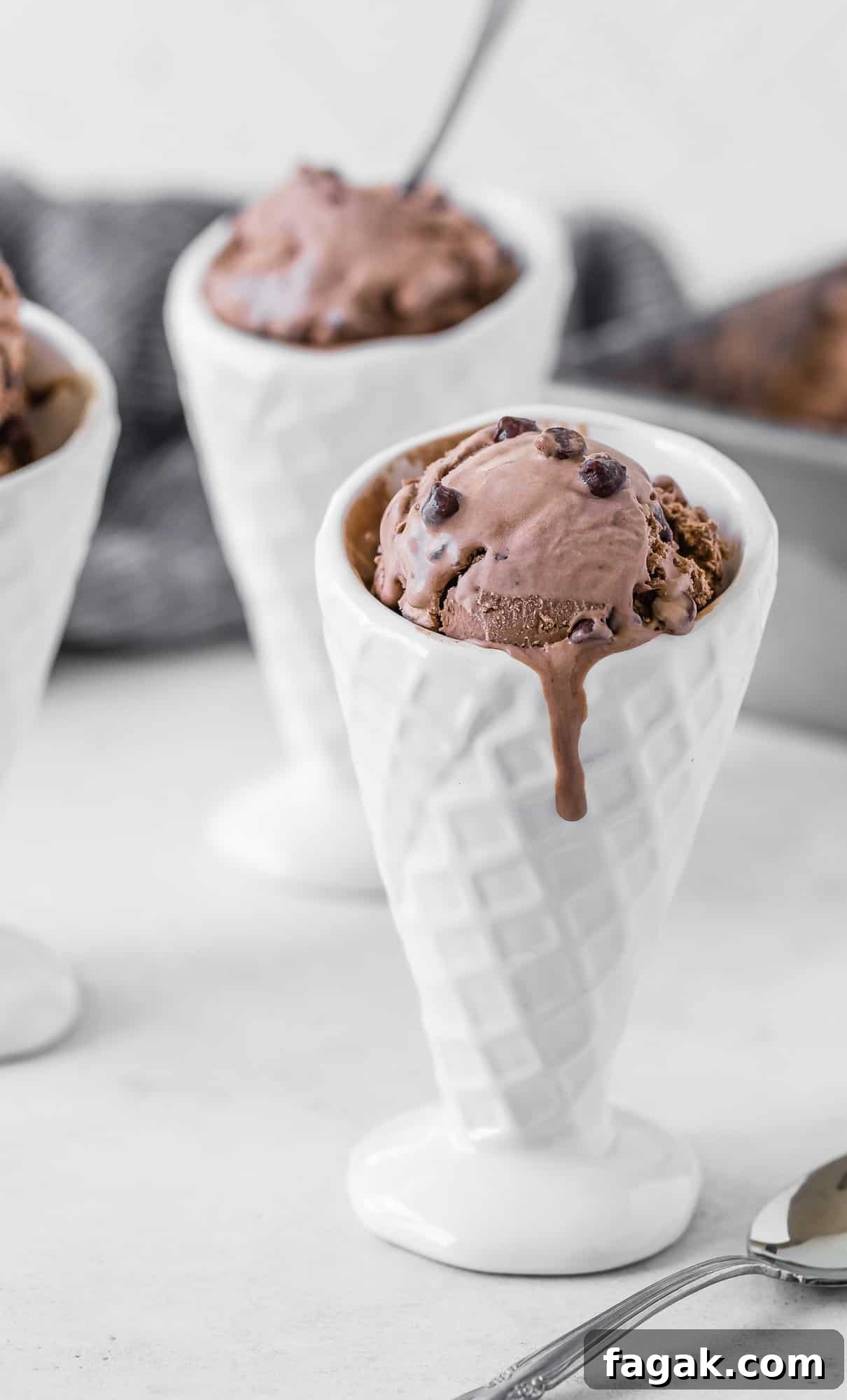 No churn double chocolate ice cream in a white ceramic cone.