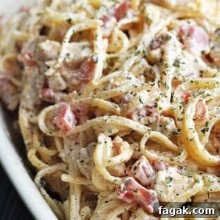 Creamy Chicken Spaghetti on a white plate