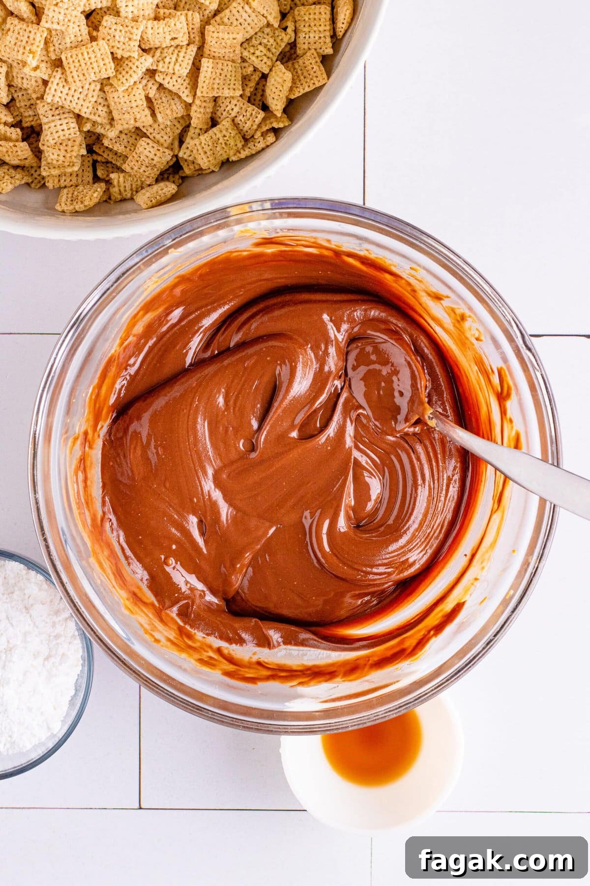 picture of melted peanut butter, butter, chocolate chips in a bowl