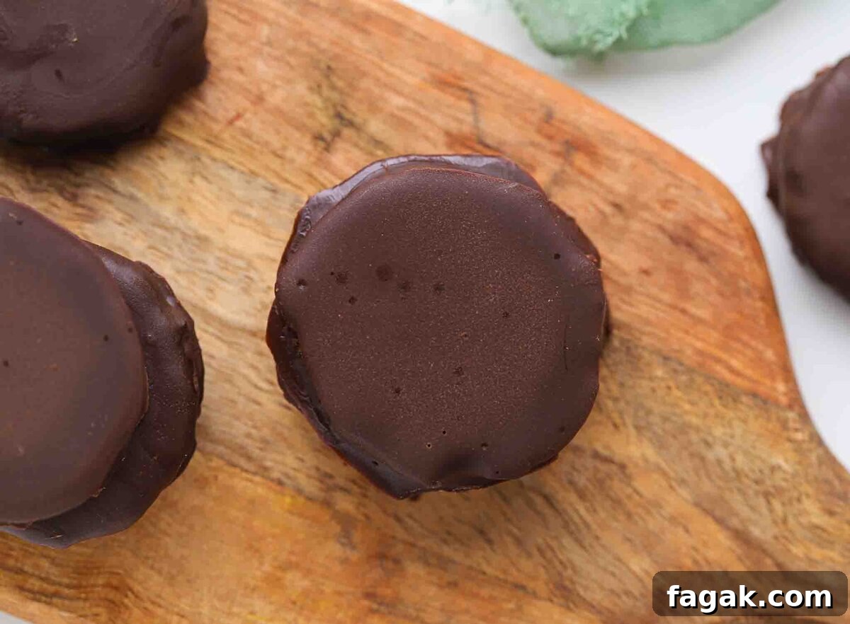 Chocolate cookies on a cutting board.